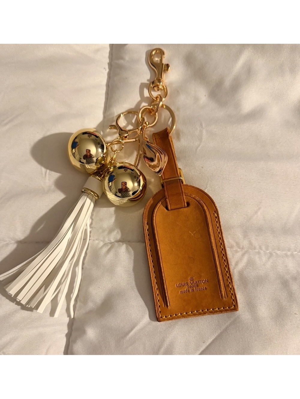 Leather Keychain with Gold-tone Charms and White Tassel